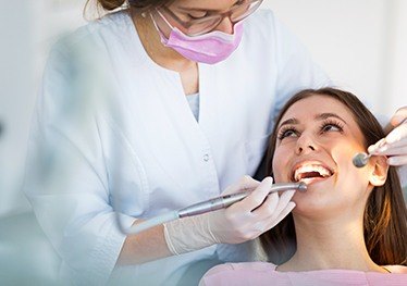 Patient receiving dental treatment