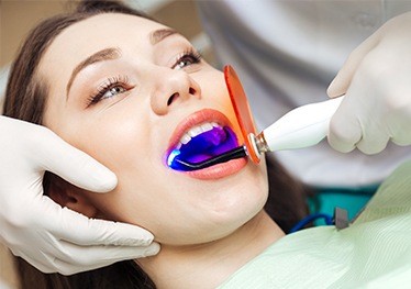 Patient receiving dental bonding