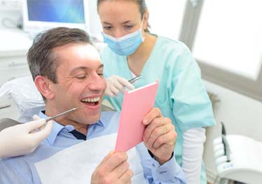 patient at dental checkup in Garland