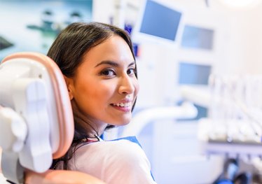 Woman smiling in dental chair