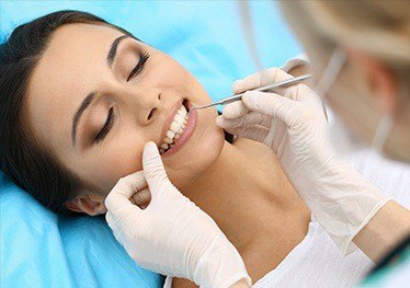 Woman in dental chair during dental visit