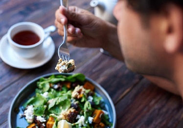 man eating healthy food in Garland