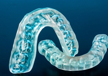 Pair of occlusal splints for TMJ treatment in Garland