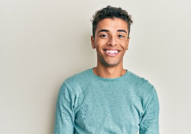 a man smiling with veneers in Garland