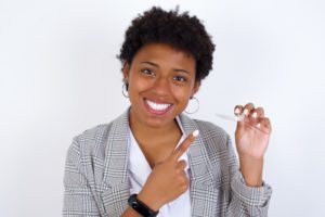 woman knows the benefits of Invisalign