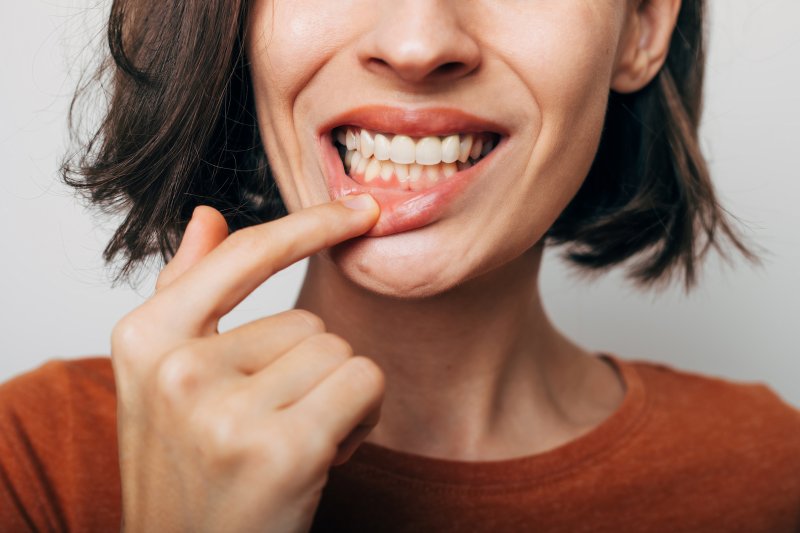 a woman trying to avoid gum disease in Garland