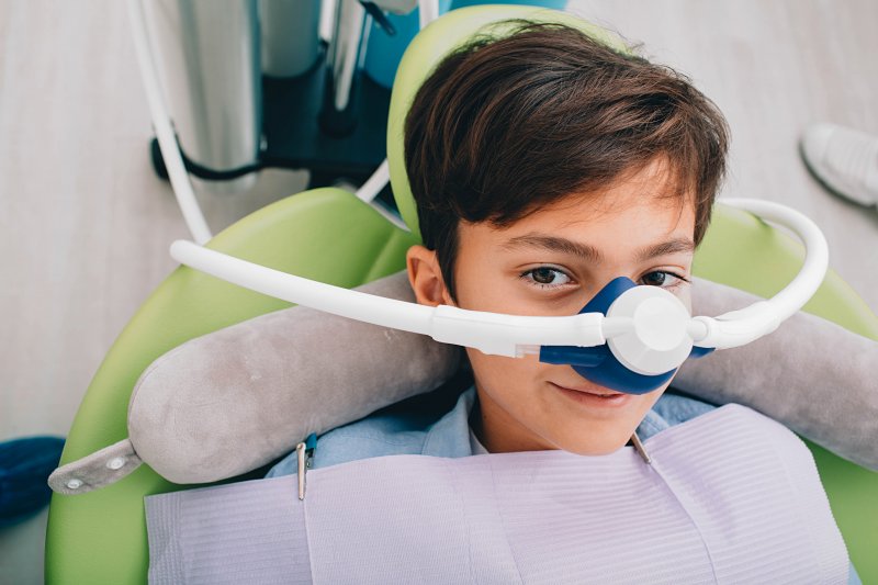 child wearing a nitrous oxide mask