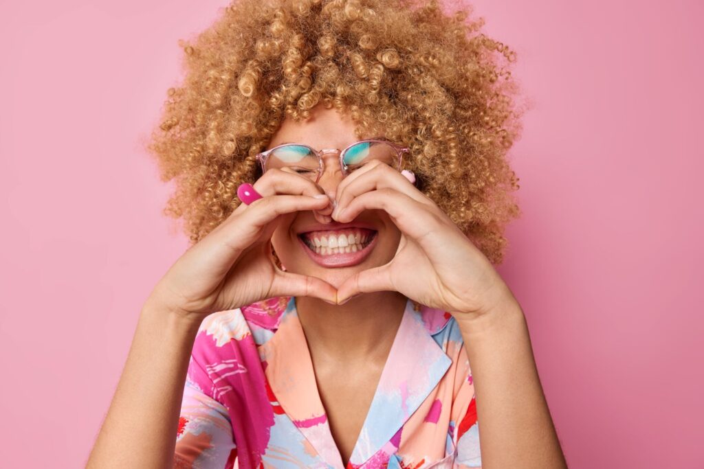 A woman smiling